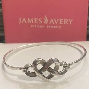 James Avery Preowned retired heart knot bangle. Measures 2 1/2 inches in length.
